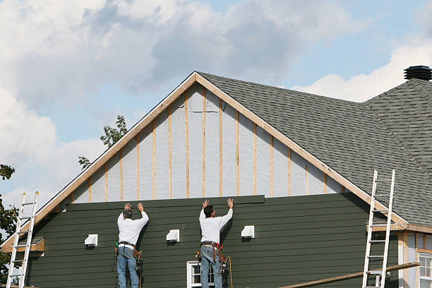 Professional Siding Replacement technician working in Graysville, OH